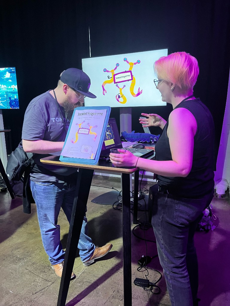 Playtest booth with XenoEtiquette flyer at Games First 2026 by Supercell